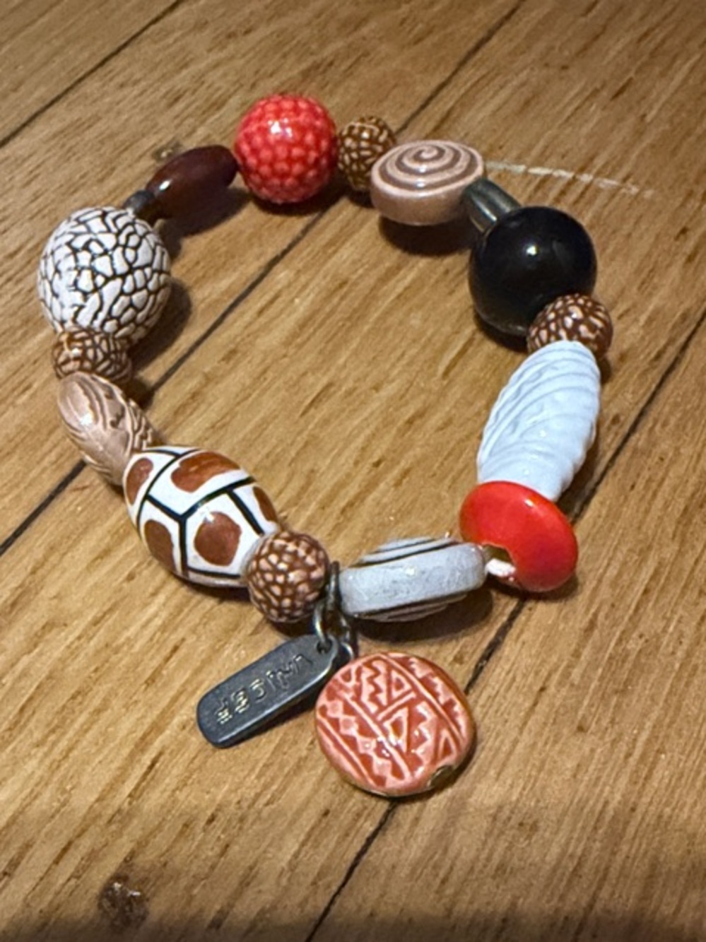 Beaded Charm Bracelet in Red, White, Black, Brown